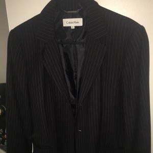 Black pinstripes blazer by Calvin Klein